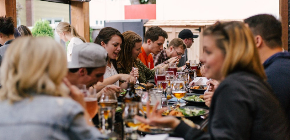 A community of people eating together