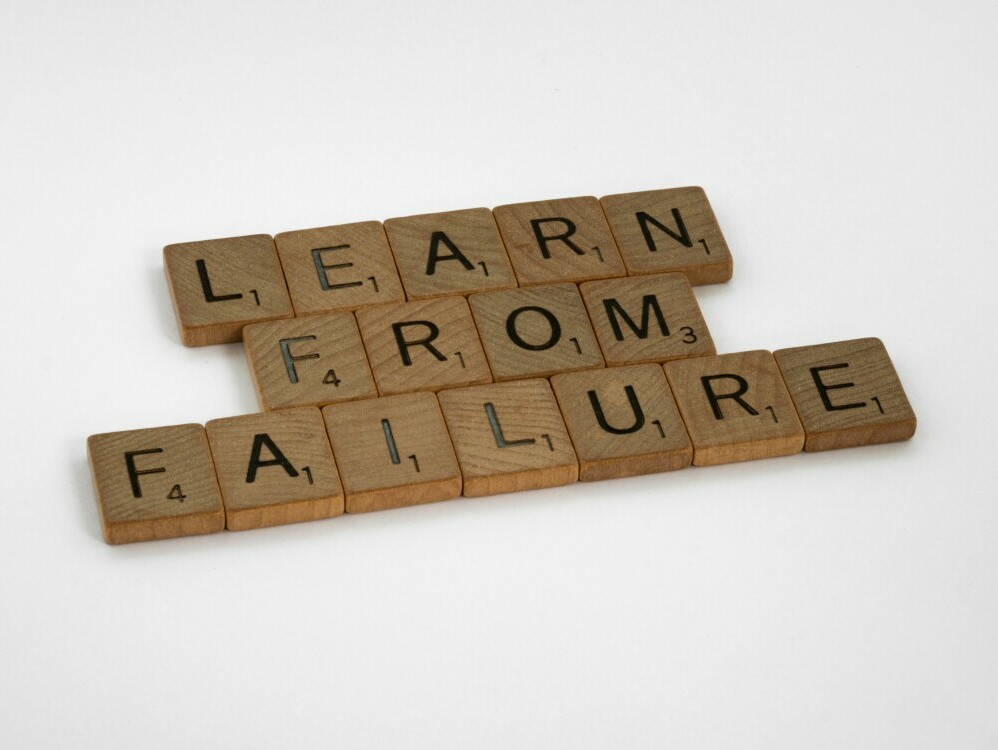 A sign that reads "Learn from failure"